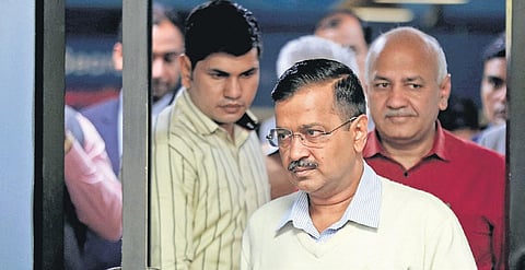 Chief Minister Arvind Kejriwal and his deputy Manish Sisodia arrive for a press conference. (PHOTO | SHEKHAR YADAV, EPS)