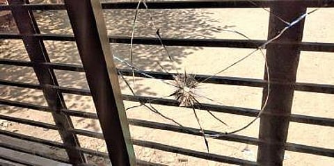 The vandalised window of the Smart Anganwadi building which is under construction at Rajaji Nagar