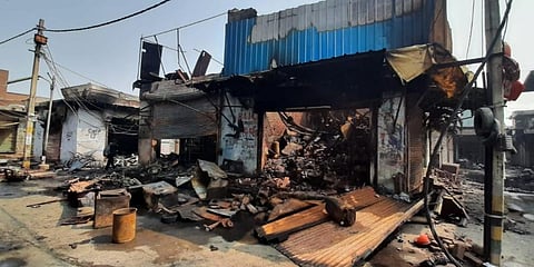 A burnt tyre shop in Gokulpuri after riots in New Delhi. (File photo| Shekhar Yadav, EPS)