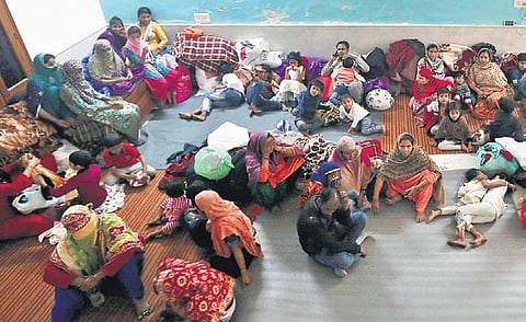 Women and children displaced after the violence take shelter in a house at Khajuri Khas area of northeast Delhi. (Photo | Shekhar Yadav, EPS)