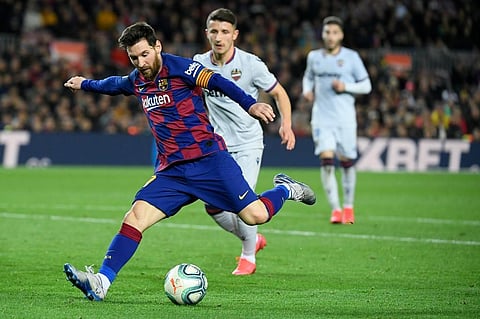 Lionel Messi kicks the ball during the Spanish league football match between FC Barcelona and Levante UD. (Photo | AFP)