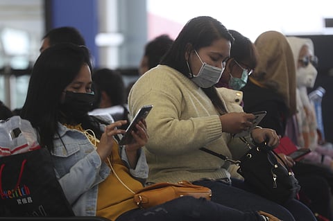 People wear masks at Hong Kong airport in Hong Kong, Tuesday, Feb. 4, 2020. (Photo | AP)