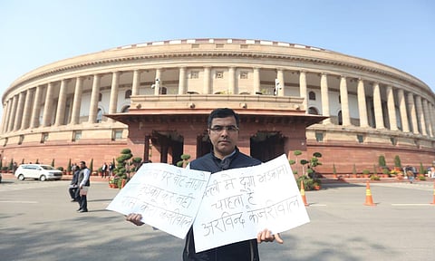 BJP MP Parvesh Verma protest against at Aam Admi Party at Parliament House in New Delhi on Wednesday. (Photo | Shekhar Yadav/EPS)