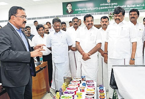 Chief Minister Edappadi K Palaniswami inspecting Aavin products displayed during Dairy Development Department’s review meeting along with Deputy Chief Minister O Panneerselvam and ministers, at Secretariat on Tuesday | special arrangement