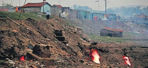 Flames rises from fissures in coal mines in Jharkhand’s Jharia.