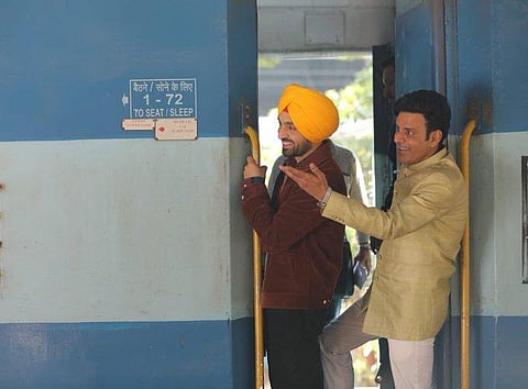 Manoj Bajpayee (R) and Diljit Dosanjh (L) in a still from their upcoming movie 'Suraj Pe Mangal Bhari'. (Photo | Twitter)