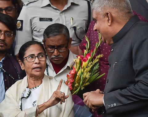 West Bengal Governor Jagdeep Dhankar R and Chief Minister Mamata Banerjee share a light moment on the first day of Budget Session at the State Assembly in Kolkata Friday Feb. 7 2020. (Photo | PTI)