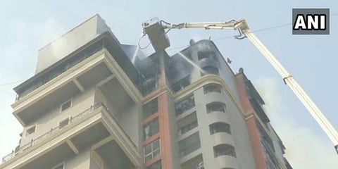 Eight fire tenders rushed to the building to fight the blaze which was brought under control. (Photo | ANI)