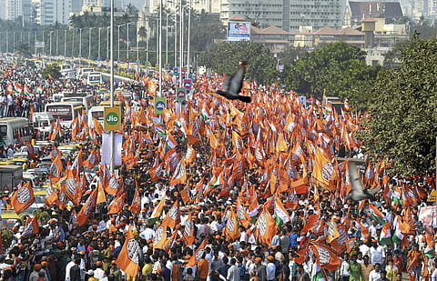 Maharashtra Navnirman Sena (MNS) workers participate in a march from Marine Drive to Azad Maidan demanding eviction of illegal Muslim immigrants from Pakistan and Bangladesh staying in India in Mumbai on Sunday. (Photo | PTI)