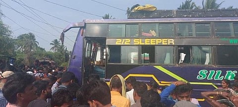 The ill-fated bus that comes in contact with a live 11 KV electric wire in Rangeilunda area in Ganjam district. (Photo | Express)