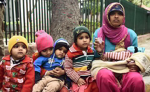Farha from Chand Bagh along with her five children came at GTB hospital looking for her Husband Sonu Dilshad. (Photo | Parveen Negi, EPS)