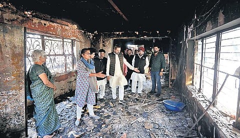 A Congress team visits a school in Mustafabad. (Photo | Shekhar Yadav, EPS)