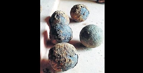 The eight cannon balls that were found during the excavation in Gandikota on Saturday.