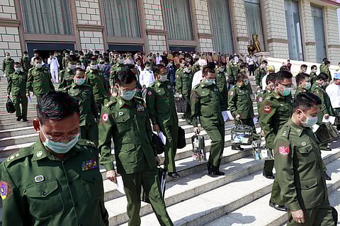 Military representatives leave after a regular session of the Union Parliament in Naypyitaw, Myanmar, Tuesday, March. 10, 2020. (Photo | AP)
