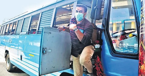 Driver Ratheesh Mohan comes out of Miyamol bus wearing a face mask. He says almost all drivers are now using face mask as instructed by the association. (Photo | A Sanesh/EPS)