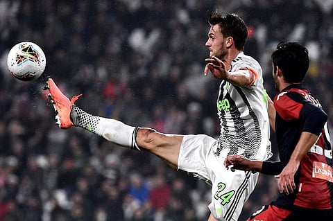 Juventus' Italian defender Daniele Rugani (L) controls the ball during the Italian Serie A football match. (Photo | AFP)