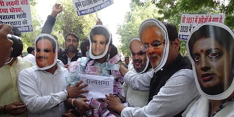 Youth Congress members mock Scindia in a protest. (Photo| Twitter)