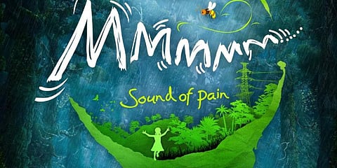 A poster of 'MMMMM...'