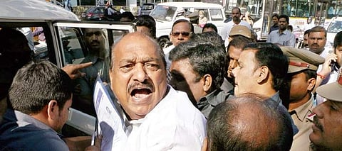 Tadipatri TDP legislator JC Prabhakar Reddy being arrested by the police at RTA office in Hyderabad on Tuesday | Express Photo