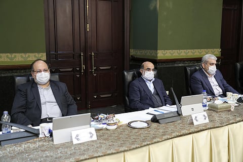 In this photo released by the official website of the office of the Iranian Presidency, cabinet members wearing face masks attend their meeting in Tehran, Iran, Wednesday, March 11, 2020. (Photo | AP)