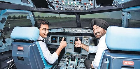 Industries Minister KT Rama Rao inside the cockpit at the inauguration of pilot training centre at FSTC in Hyderabad.