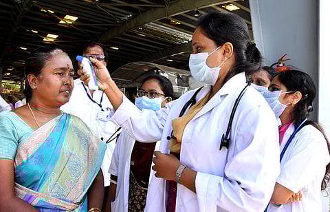 TTD health wing screening devotees with thermal scanners to identify the symptoms of COVID-19 at Alipiri check post in Tirupati. (Photo | Madhav K, EPS)
