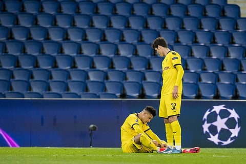 Borrusia Dortmund players in an empty stadium because of the coronavirus outbreak. (Photo | AP)