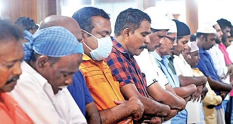 Amid the COVID-19 scare, a believer wearing a face-mask takes part in the Friday namaz at the Juma Masjid in Kaloor | A Sanesh