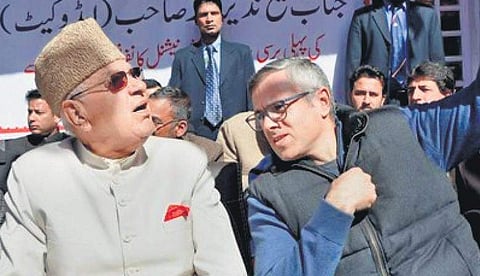 National Conference patron Farooq Abdullah and son Omar (Photo | EPS)