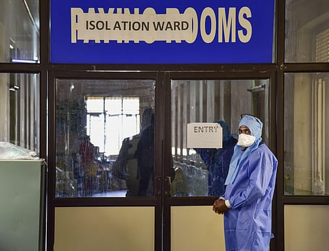 A medic stands outside an isolation ward. (Photo| PTI)