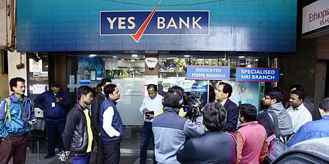 Customers outside Yes Bank branch in New Delhi. (File photo | Parveen Negi, EPS)
