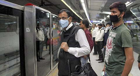 Delhi metro passenger wear masks to prevent the spread of coronavirus. (Photo | Anil Shakya, EPS)