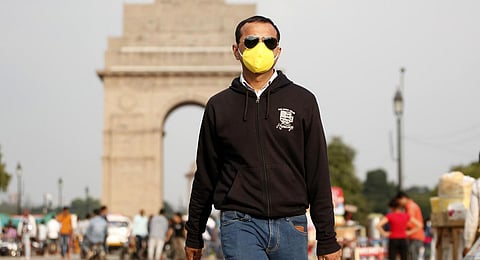 Tourist wear mask as a precaution against the spread of coronavirus. (Photo | Anil Shakya, EPS)