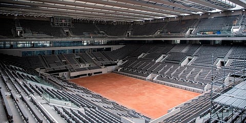 Construction work of the newly built roof of the Philippe Chatrier center court is pictured at Roland Garros stadium in Paris. (File photo| AP)