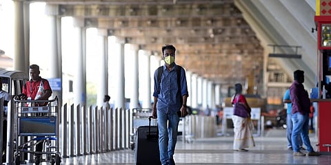Passengers are seen wearing masks to keep them away from coronavirus at Chennai Airport. (Photo| R Satish Babu, EPS)