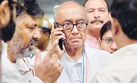 Congress leader Digvijaya Singh with KPCC president-designate D K Shivakumar after meeting city police chief Bhaskar Rao in on Wednesday | Nagaraja Gadekal
