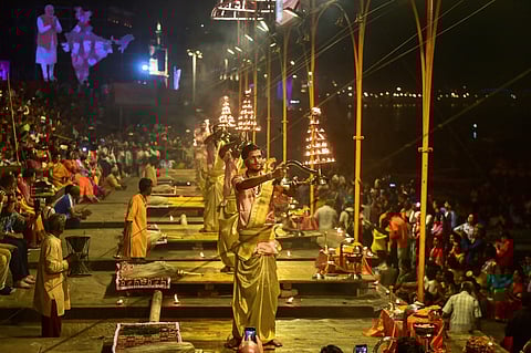 Varanasi district administration banned the Ganga Aarti and Yoga camps in the Laxmanjhula area of Tehsil Yamkeshwar till 31 March. Tourists have also been disallowed to be involved in Aarti programs in temples. (Photo | EPS)