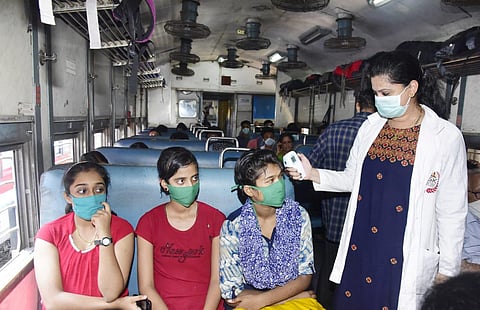 People get screened inside trains. (Photo| EPS/ G satyanarayana)
