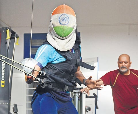 Having guided fencer Bhavani Devi and other sportspersons, Ramji Srinivasan (back) recommends bodyweight exercises and pilates to help maintain fitness levels