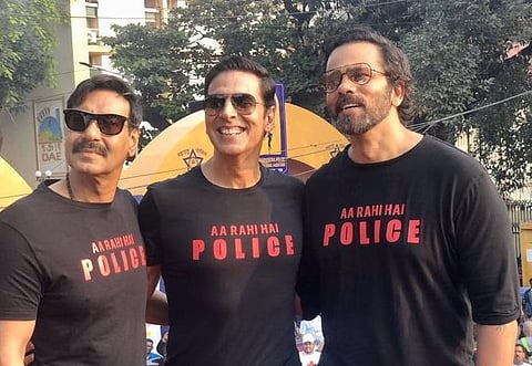Ajay Devgn along with his Bollywood colleagues Akshay Kumar and filmmaker Rohit Shetty. (Photo | Twitter)