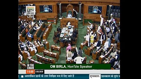 Lok Sabha witnesseed protests from Opposition who stormed the well