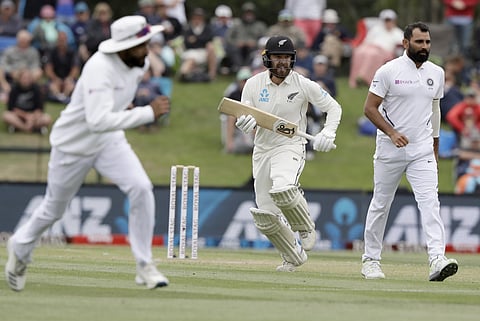 New Zealand opening batsman Tom Blundell runs past Indian bowler Mohammed Shami, right, during play on day three of the second cricket test between New Zealand and India at Hagley Oval in Christchurch, New Zealand, Monday, March 2, 2020. (Photo | AP)
