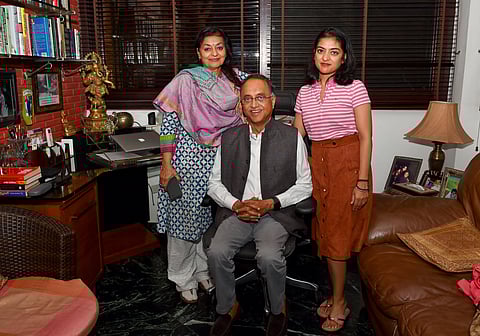 Former Commissioner of Delhi Police Neeraj Kumar flanked by wife and daughter at his residence in New Delhi Friday March 20 2020. (Photo | PTI)