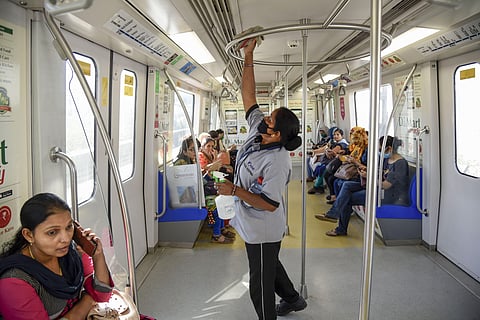 Workers sanitize Mumbai Metro in the wake of coronavirus pandemic in Mumbai Thursday March 19 2020. (Photo | PTI)