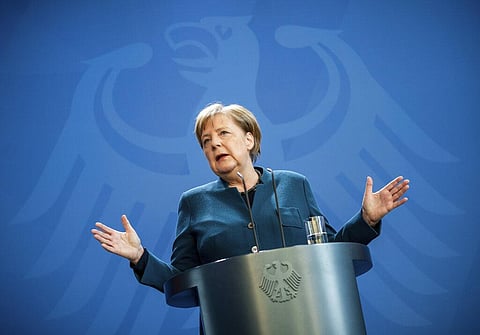 German Chancellor Angela Merkel speaks at a press conference about coronavirus, in Berlin. (Photo | AP)