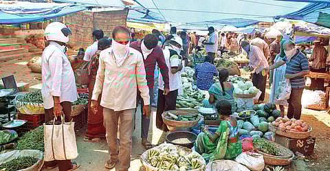 People rush to Monda Market in Secunderabad to stock up on vegetables on Saturday