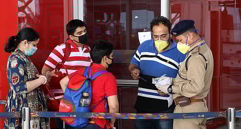 Passengers wearing masks in the wake of Coronavirus outbreak at Indira Gandhi International airport in New Delhi. (Photo | Ashish kumar Kataria, EPS)