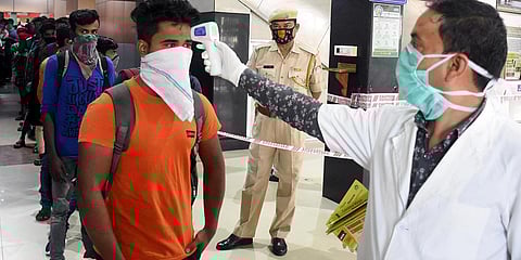 Thermal screening of passengers being conducted amid coronavirus outbreak, at Guwahati Railway Station. (Photo| ANI)