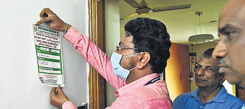 Quarantine notice being pasted at a house in Kilpauk, Chennai | Ashwin Prasath