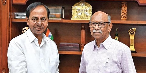 Retired IAS officer KR Venugopal presenting a cheque of Rs 2 crore to Chief Minister K Chandrasekhar Rao, donated by Anupama Nadella, his daughter and wife of Satya Nadella, Microsoft CEO on Tuesday. (Photo| EPS)